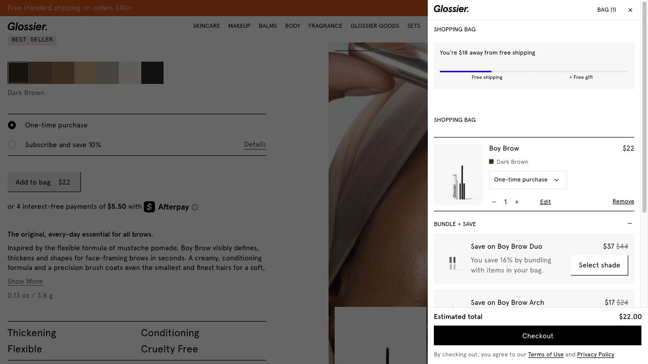 Glossier cart drawer showing shipping progress, product controls, bundle options, estimated total, and checkout button